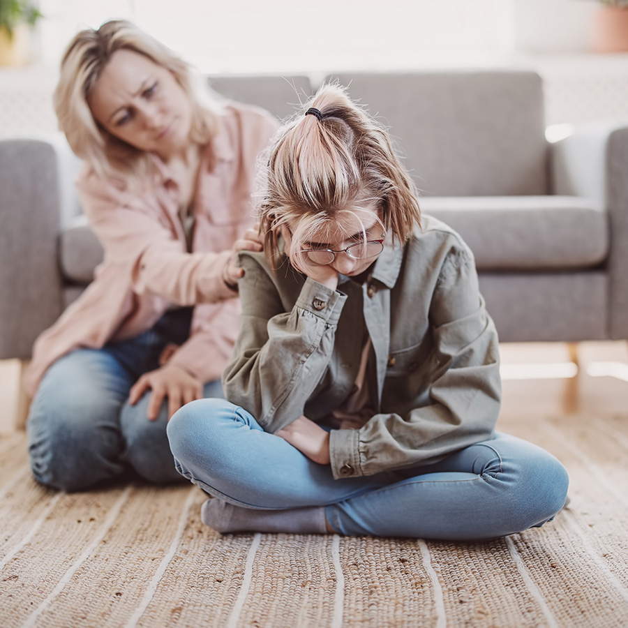 Upset daughter with mother