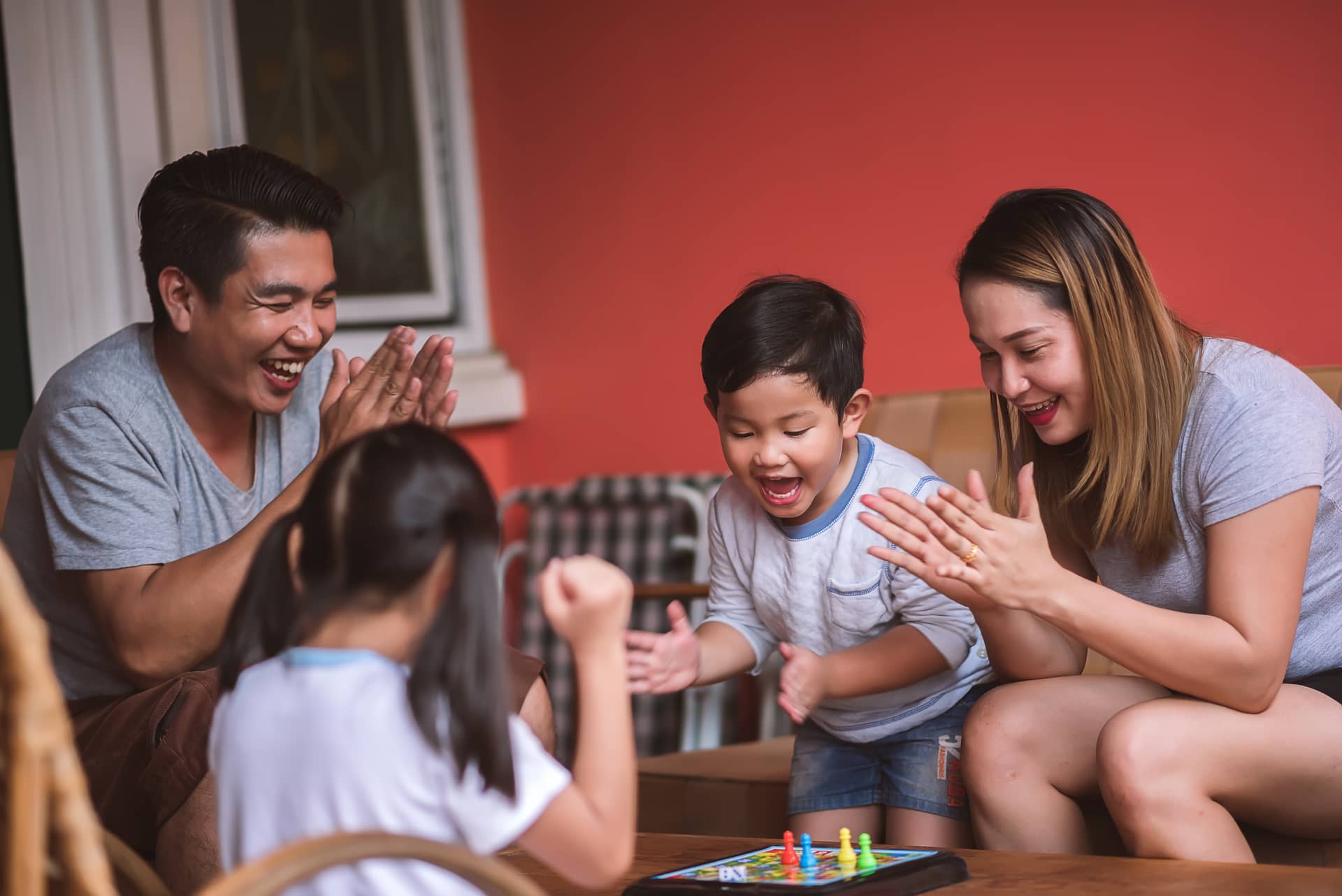 happy-family-having-fun-with-chess-board-game-2025-01-09-01-42-21-utc (1)