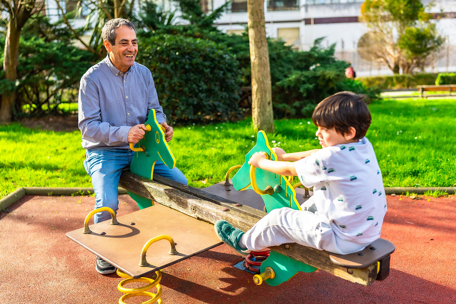 man-and-child-play-on-a-seesaw-outdoors-2026-03-25-03-35-20-utc